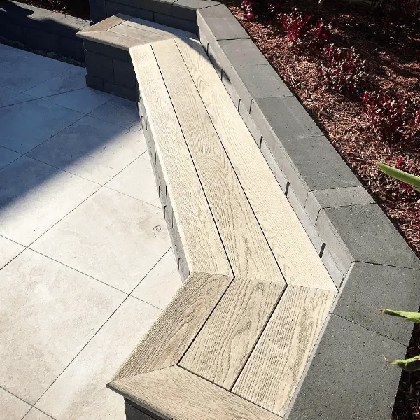 Timber bench seat on a garden edge