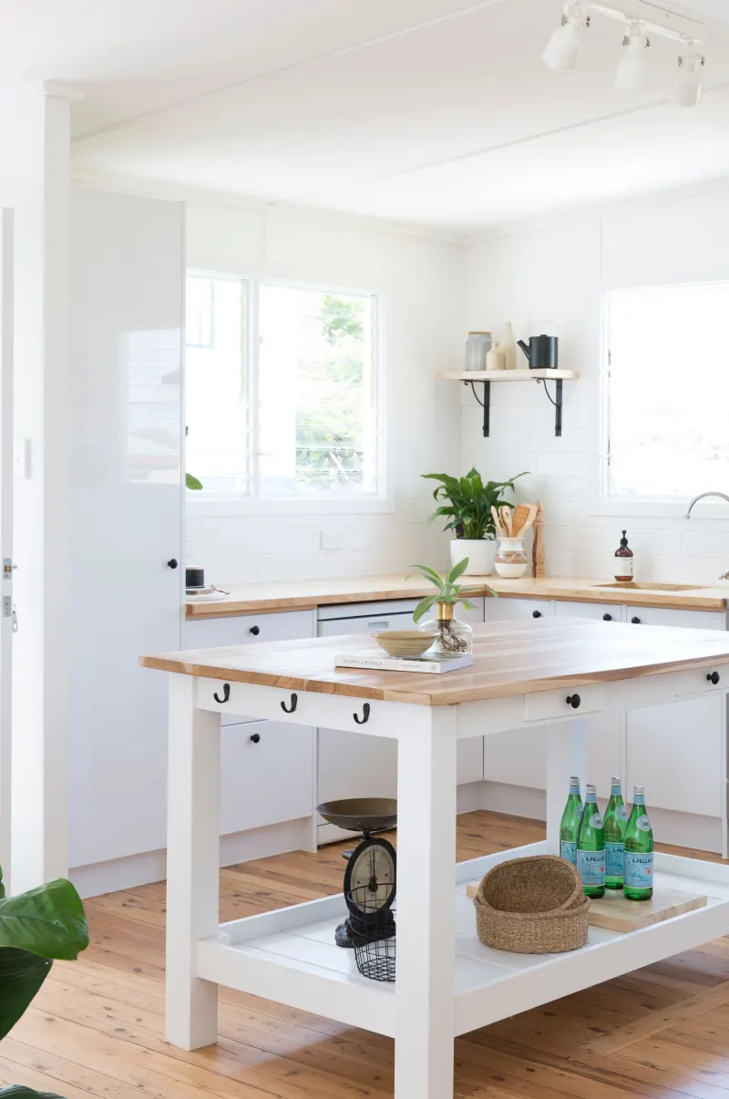 White kitchen with a freestanding island bench