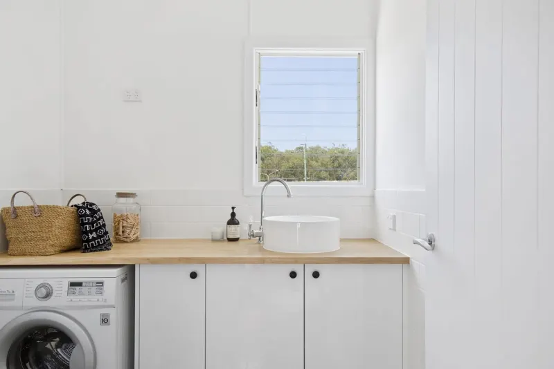 Laundry with a timber benchtop