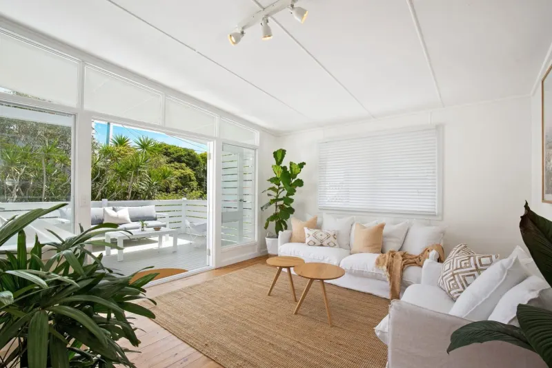 Living room opening onto a timber deck